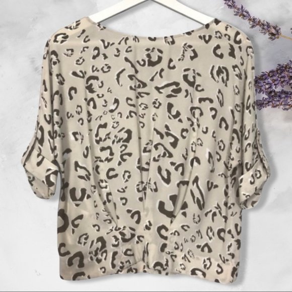 BCBGMaxAzria Tops - BCBGMaxazria animal print top xxs pleated hem